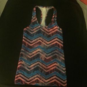 Ivivva size 8 racerback tank in hot pink, blue and black chevron EUC